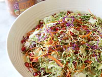 2059Recipe: Shaved Brussels Sprout Slaw with Sesame Ginger Dressing, Pumpkin Seeds and Pomegranate